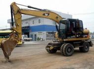 Колесный экскаватор cat 313d